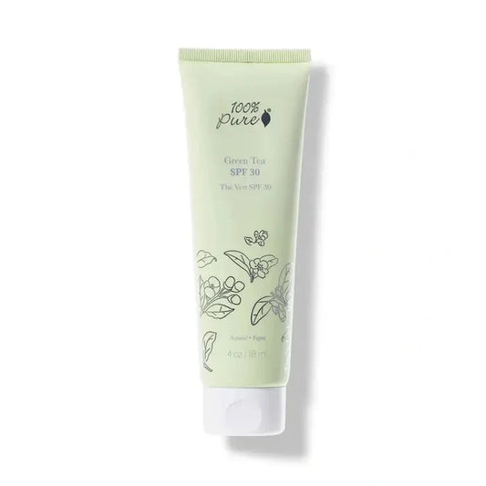 Green tube of sunscreen with branding on a white background