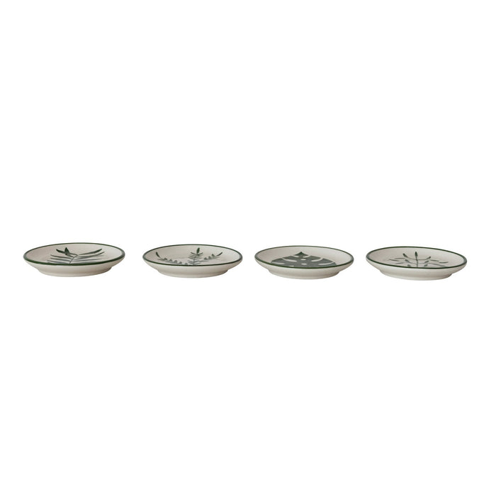 Set of four CREATIVE COOP HAND-PAINTED STONEWARE PLATES, each with a unique botanical design and green rim. Delicate green leaf patterns make every appetizer plate an artful addition to your table.