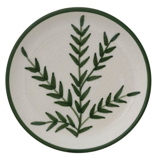 Set of four CREATIVE COOP HAND-PAINTED STONEWARE PLATES, each with a unique botanical design and green rim. Delicate green leaf patterns make every appetizer plate an artful addition to your table.