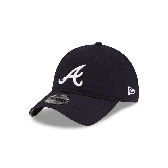 https://cdn.shopify.com/s/files/1/0601/2554/4675/files/60769558_9TWENTY_MLB25XHIDDENPIGEONS_COLLAB25_ATLBRA_NAV_3QL.jpg?v=1752090954