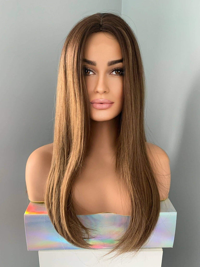 Holly Silky Straight Brown Wig displayed on a mannequin showcasing its sleek, glossy texture and long length.
