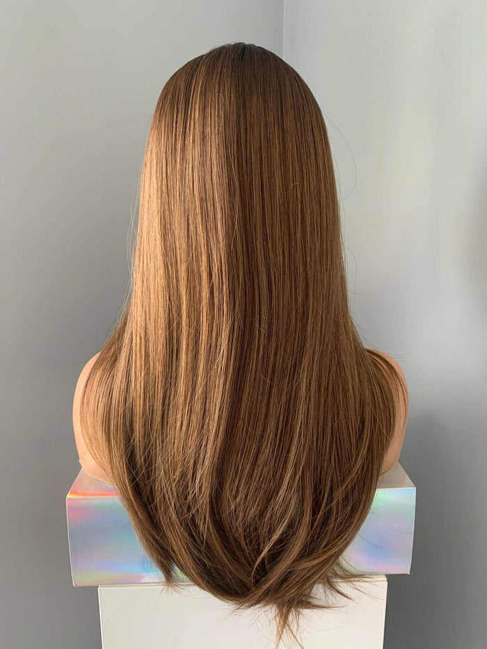 Back view of a Holly Silky Straight Brown Wig showing its smooth length and glossy finish.