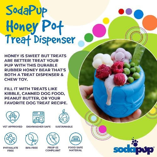 The SODA PUP HONEY POT DOG TREAT DISPENSER - YELLOW LARGE is a durable, barrel-shaped plastic enrichment toy for dogs, featuring a hexagonal pattern and a bee symbol on the side that mimics a honey pot. Shown against a plain white background, this puzzle feeder doubles as a treat dispenser to provide mental stimulation for your pup.