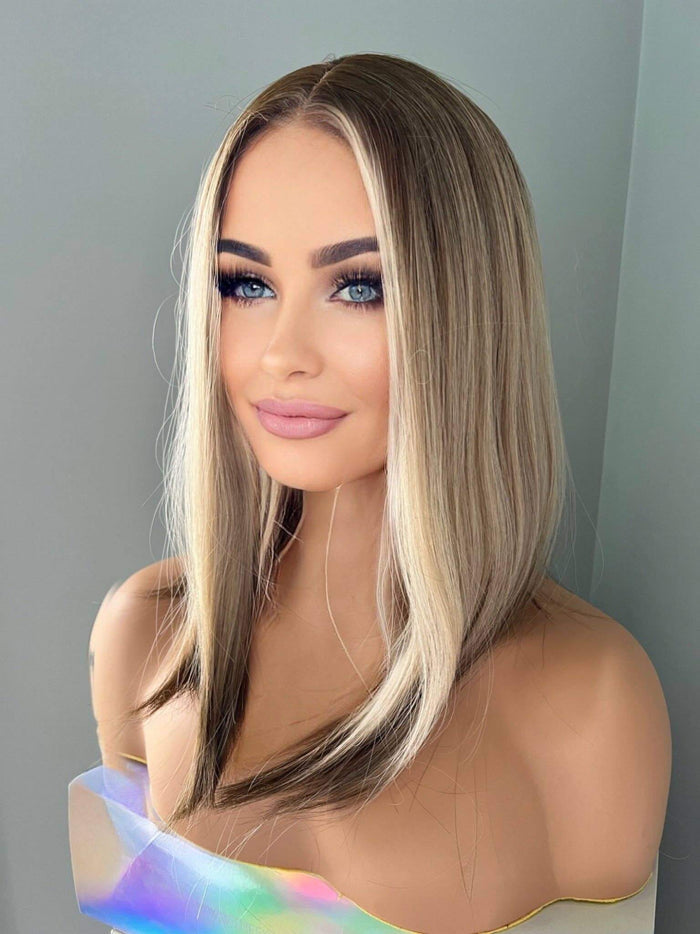 Jenna Short Rooted Blonde Wig with Low Lites by The Extension Room, featuring dimensional lowlights and face-framing layers.
