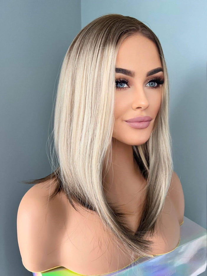 Jenna Short Rooted Blonde Wig with Low Lites features sleek layers and a modern look, perfect for any style.