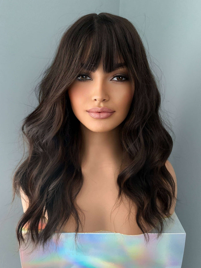 Kayla Long Dark Brown Wig with Bangs showcasing soft waves and a stylish fringe.