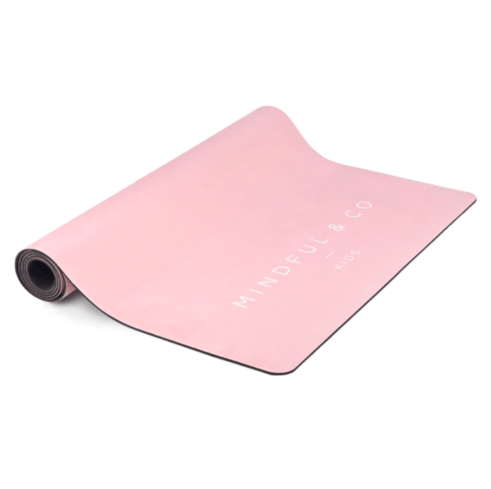Pink yoga mat with 'MINDFUL & CO' branding on a white background