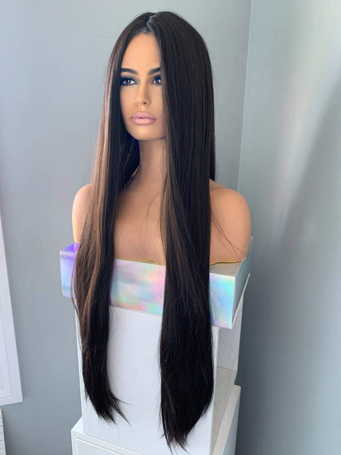 Kim Long Black Silky Straight Partial Lace Front Wig displayed on a mannequin, showcasing its 34-inch length and sleek style.