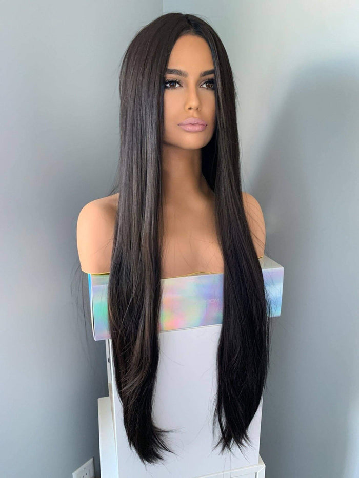 Kim Long Black Silky Straight Partial Lace Front Wig displayed on a mannequin showcasing its sleek, ultra-long 34-inch length.