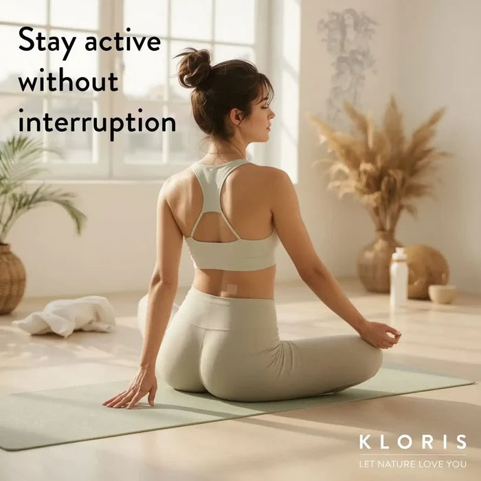 Woman practicing yoga in a serene room with plants and light decor, promoting active lifestyle.