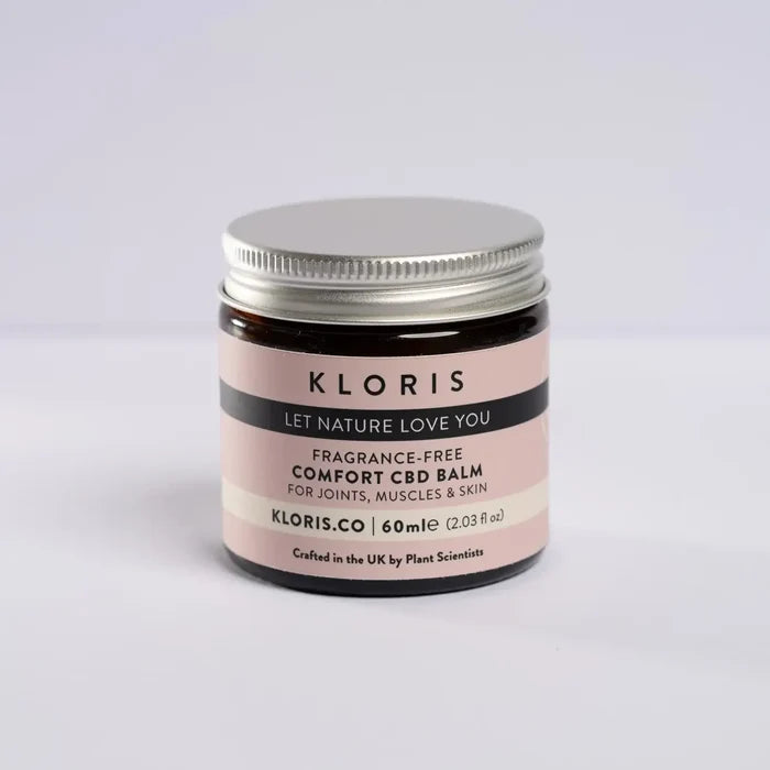 Jar of Kloris Comfort CBD Balm on a light gray background