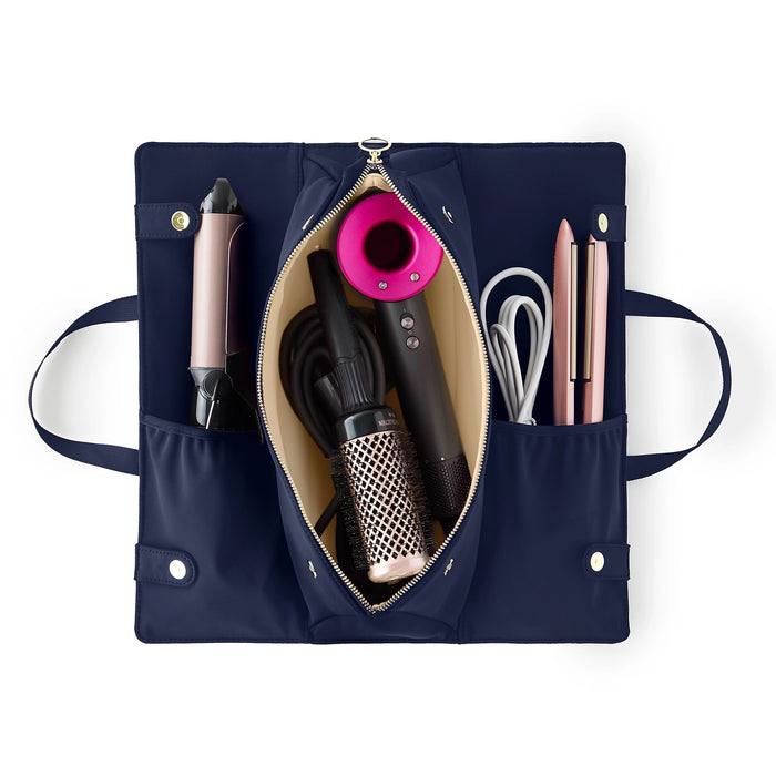 The KUSSHI - Hair Tools Travel Bag in Navy is a rectangular, heat-resistant case with zipper closure, small carrying handles, and the KUSSHI label on the front.