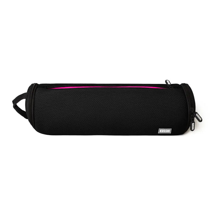 The KUSSHI Hair Tools Travel Case in Black by KUSSHI, with a heat-resistant open design, neatly holds a round hairbrush with a gold barrel and brown handle, plus a white curling iron inside.