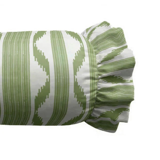 The LOOM & CLOTH - Ikat Stripe Ruffled Bolster Pillow in Green is a cylindrical bolster pillow with green and white wavy stripes, crafted with a 100% cotton cover and finished with ruffled ends, shown against a plain white background.