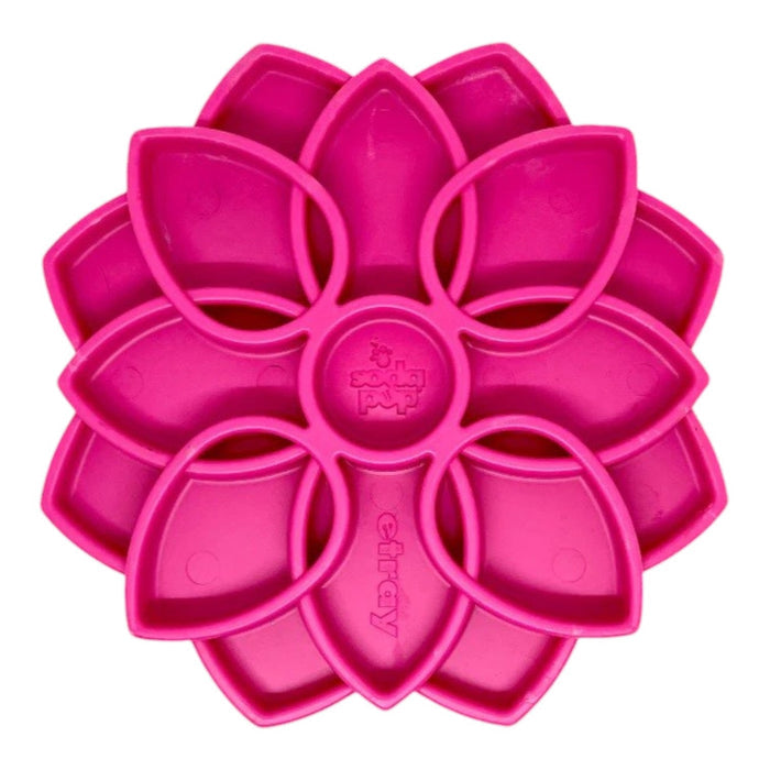 The SODA PUP Mandala Etray Slow Feeder Enrichment Dog Bowl in pink features a flower-inspired silicone design with multiple petal-shaped compartments, ideal for use as a shallow slow feeder or enrichment tray to make your dog's mealtime more engaging, or for baking and crafting activities.