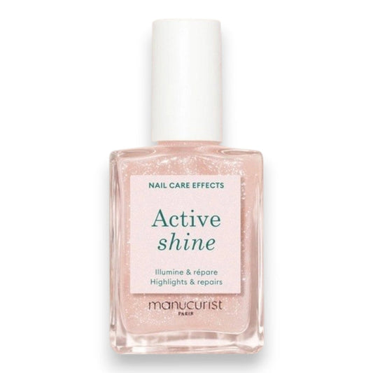 MANUCURIST - ACTIVE™ SHINE TREATMENT POLISH by MANUCURIST INC is a shimmery pink nail treatment polish formulated with beetroot extract for hydrating and providing antioxidant care to nails, AHAs to restore and harden, and hexanal to help strengthen them. The product contains 79.5% plant-based ingredients.