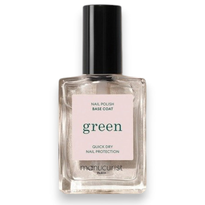 A clear glass bottle of MANUCURIST - GREEN™ BASE COAT by MANUCURIST INC, featuring a black cap and a white label with green and black text, part of their vegan nail care collection.