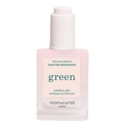 A bottle of MANUCURIST - GREEN™ DRYING DROPS by MANUCURIST INC features a white cap and contains a pale pink liquid. The label displays “Express Dry Intense Nutrition,” making it an ideal addition to your quick-dry manicure routine, as it nourishes cuticles for healthier, more beautiful nails.