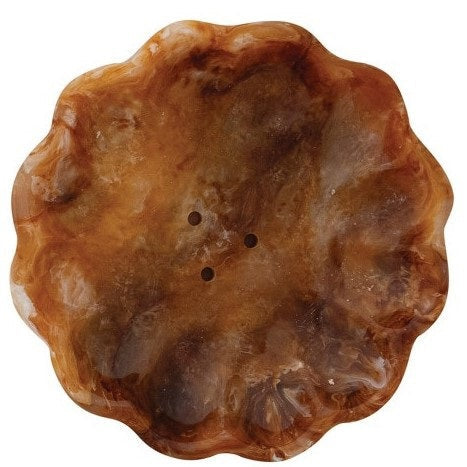 Three CREATIVE COOP MARBLED RESIN FLOWER-SHAPED SOAP DISHES in green, brown, and yellow are displayed side by side on a plain white background. Each decorative dish features scalloped edges and a unique marbled pattern.