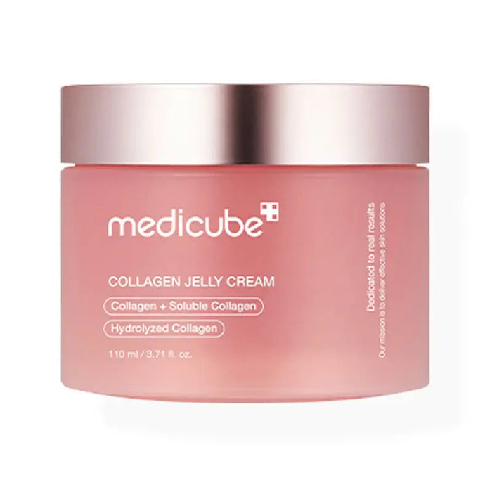 The MEDICUBE - COLLAGEN JELLY CREAM from ASIAN BEAUTY WHOLESALE features a pink gel-like texture with "NO ARTIFICIAL COLORS" and "Enhanced with natural vitamin ingredients for a vibrant pink hue!" on a light pink background. Experience Korean Glass Glow and enjoy its anti-aging benefits.