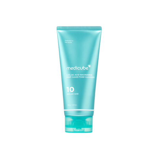 MEDICUBE Azelaic Acid Niacinamide Deep Clean Foam Cleanser is a creamy cleanser designed to deeply cleanse pores while helping reduce redness and improve uneven skin tone. Formulated with Azelaic Acid and Niacinamide, it supports a clearer, more balanced complexion, while Salicylic Acid helps remove excess oil and unclog pores. With added Glycerin, Hyaluronic Acid, Ceramides, and Centella Asiatica Extract, it hydrates and helps protect the skin barrier, leaving skin feeling clean, smooth, and re