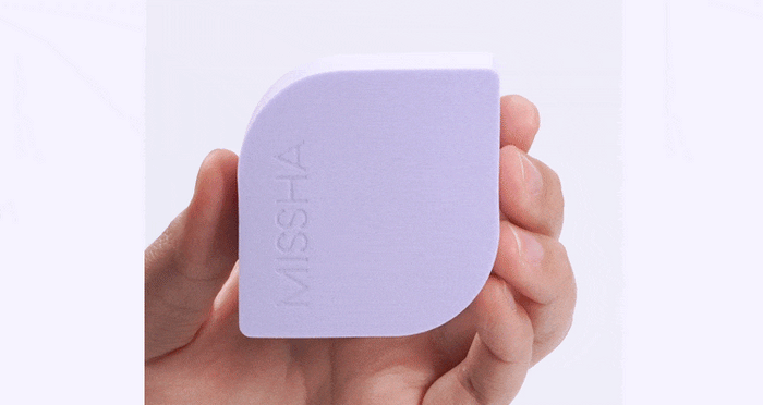 GIF of the MISSHA layering fit puff being squeezed to showcase it softness.