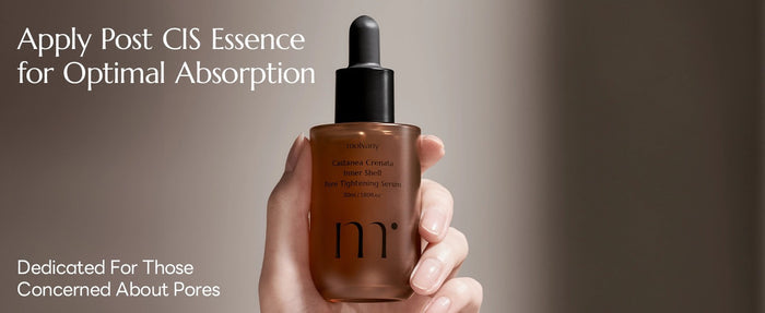 A hand holds a dropper bottle with MOLVANY - CASTANEA CRENATA INNER SHELL PORE TIGHTENING SERUM infused with Korean Yulpi extract. The label reads "Apply Post CIS Essence for Optimal Absorption" and is dedicated to those concerned about pores and skin hydration. Brand: HONG CHEON USA, INC.