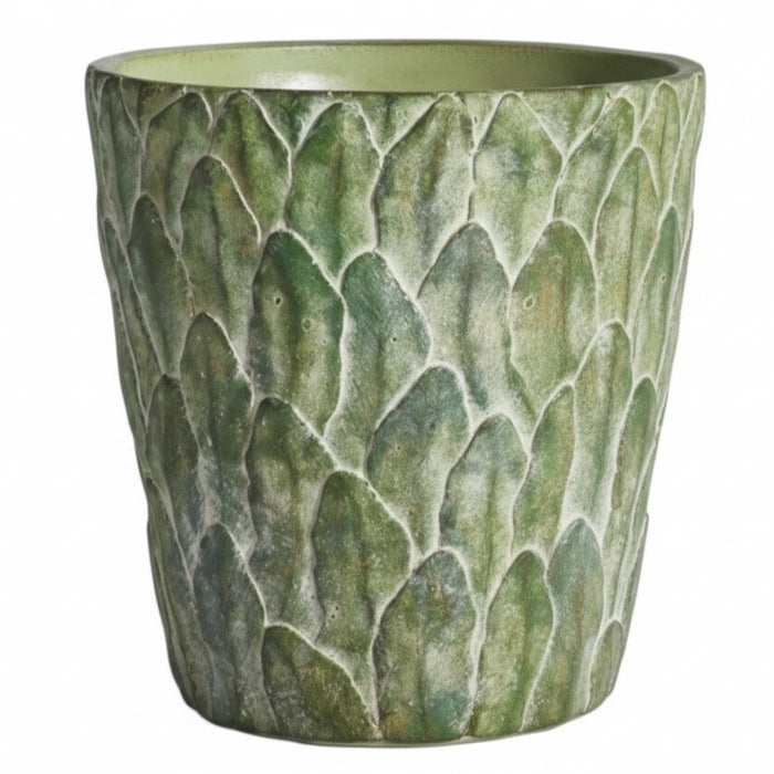The NAPA HOME AND GARDEN - FELDBURG POT, LARGE is a green ceramic cachepot with a textured, leaf-like pattern and a slightly flared rim, perfect for adding decorative charm to your space.