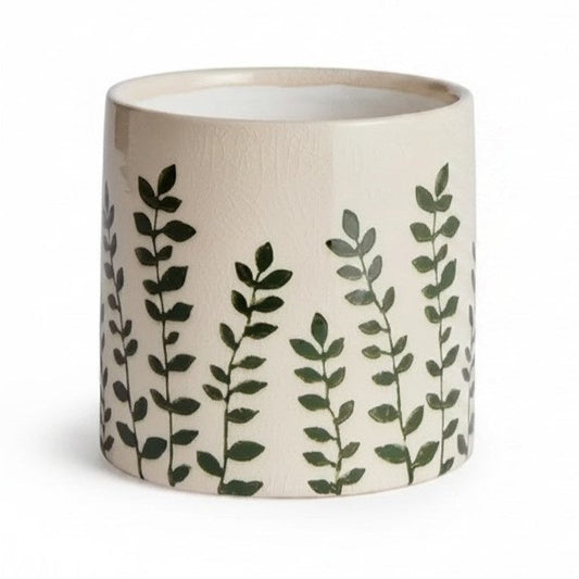 The NAPA HOME AND GARDEN Maren Pot, Small, features embossed leafy designs on white ceramic—a perfect orchid vessel to pair with its larger counterpart for a coordinated display.