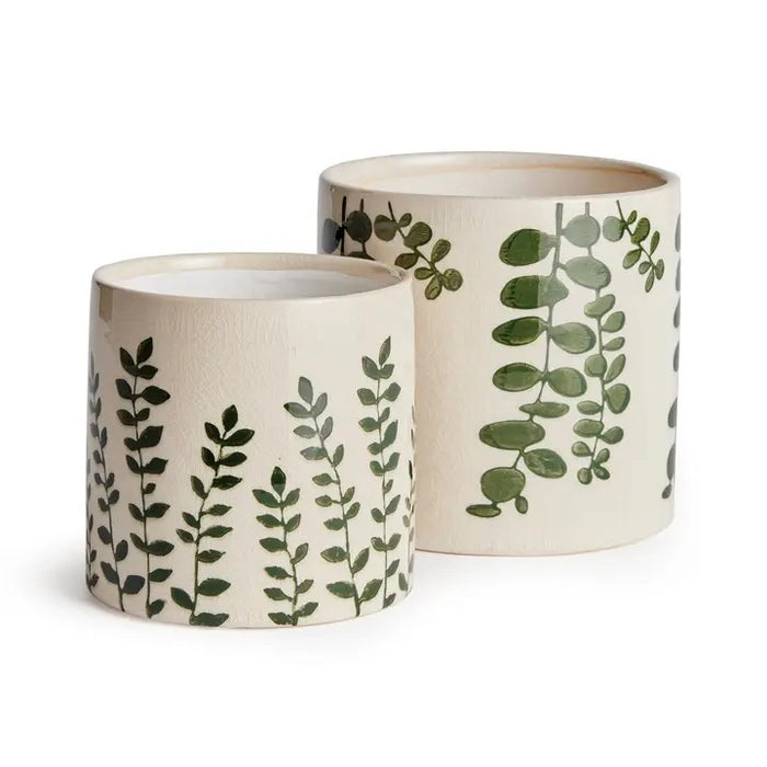 The NAPA HOME AND GARDEN Maren Pot, Small, features embossed leafy designs on white ceramic—a perfect orchid vessel to pair with its larger counterpart for a coordinated display.