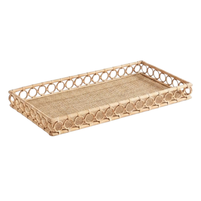 The NAPA HOME AND GARDEN Ninette Rectangular Rattan Tray, Large, features raised sides and a decorative open circle edge in natural beige—ideal for bringing boho coastal charm to your home decor.
