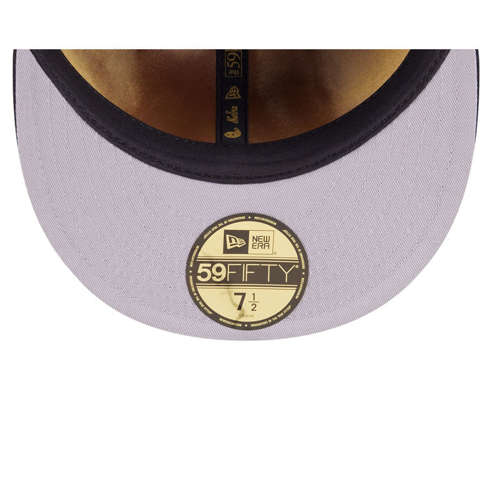 https://cdn.shopify.com/s/files/1/0601/2554/4675/files/60750860_59FIFTY_5950DAY595027040_ATLBRA_BLK_UV.jpg?v=1745502719