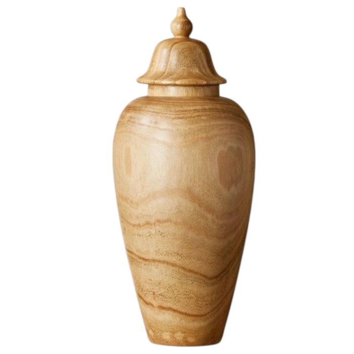 The PAULOWNIA WOOD COVERED TEMPLE JAR - SMALL by TWO'S COMPANY features a light brown paulownia wood construction with a rounded body, subtly narrow base, and a decorative lid. Its visible wood grain offers a natural and smooth look, making it an exotic accent piece for the home. The jar is shown standing upright against a white background.