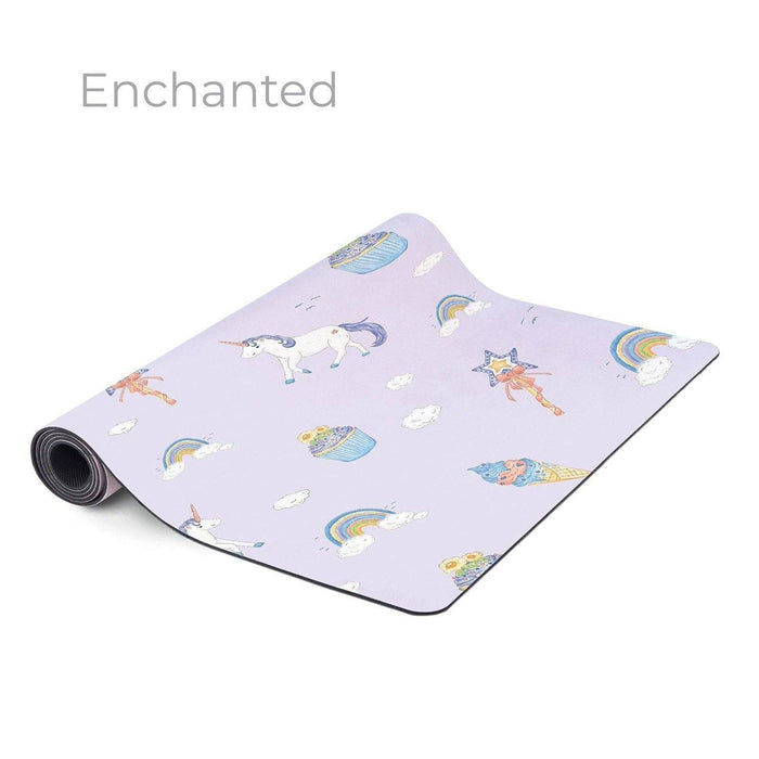 Yoga mat with unicorn and rainbow designs on a white background