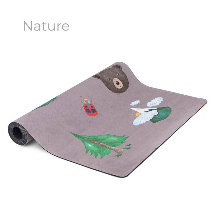 Children's play mat with nature-themed design on a white background