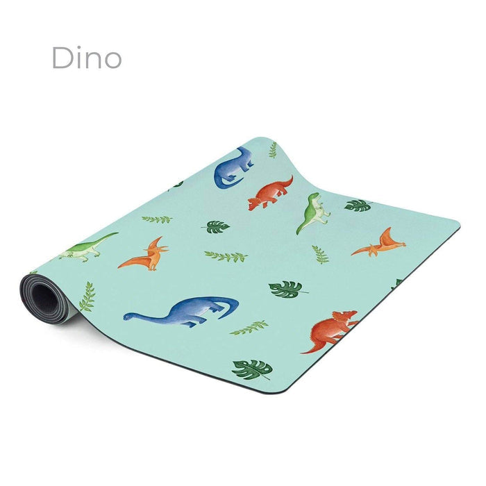 Yoga mat with dinosaur pattern on a light blue background
