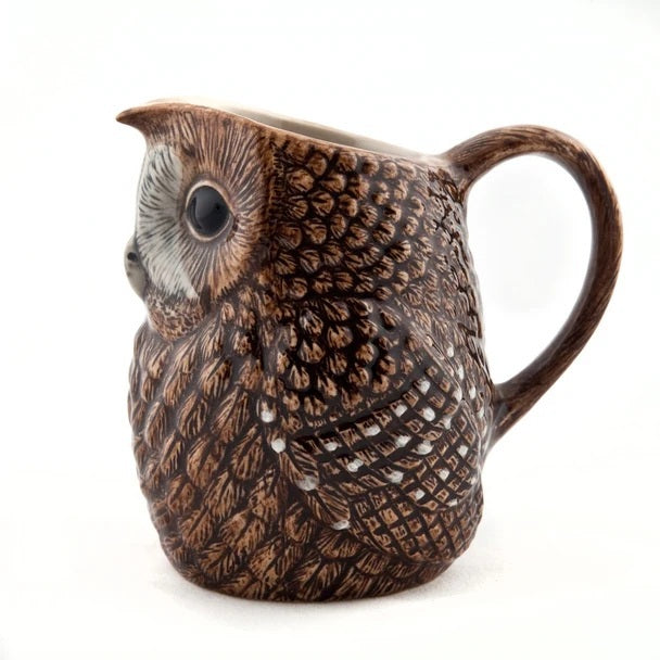 The QUAIL CERAMICS - TAWNY OWL JUG, LARGE by QUAIL DESIGNS is a hand-painted stoneware piece featuring detailed feather markings and large black eyes; this carefully crafted ceramic owl faces forward against a plain white background.