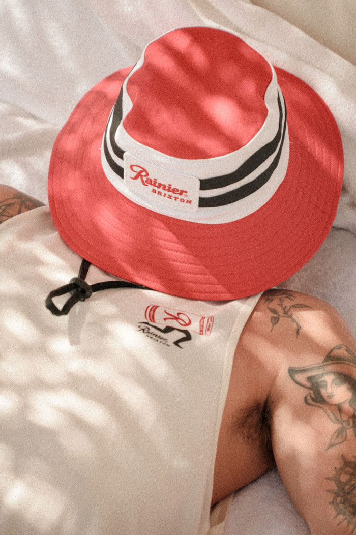 Unisex Rainier X Brixton Boonie in the color Natural/Red - Men's Lifestyle image