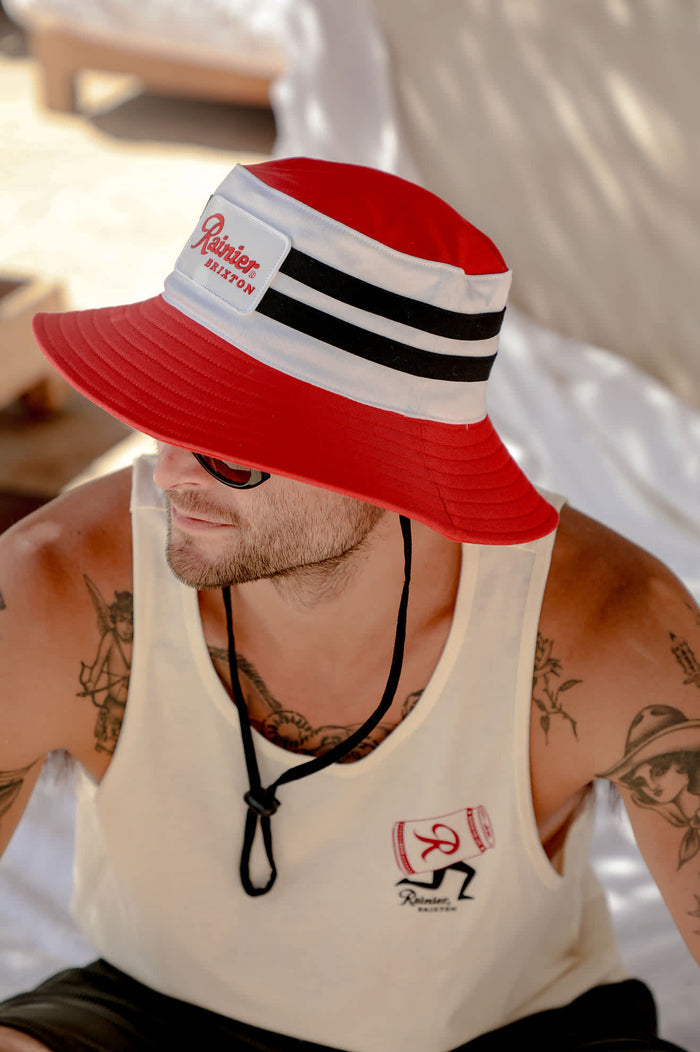 Unisex Rainier X Brixton Boonie in the color Natural/Red - Men's Lifestyle image