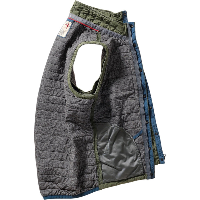 The RELWEN Windzip Vest in Olive is a quilted utility vest with green and blue trim, snap button closures, armholes, and an inner pocket—ideal for layered warmth. Shown open and laid flat.