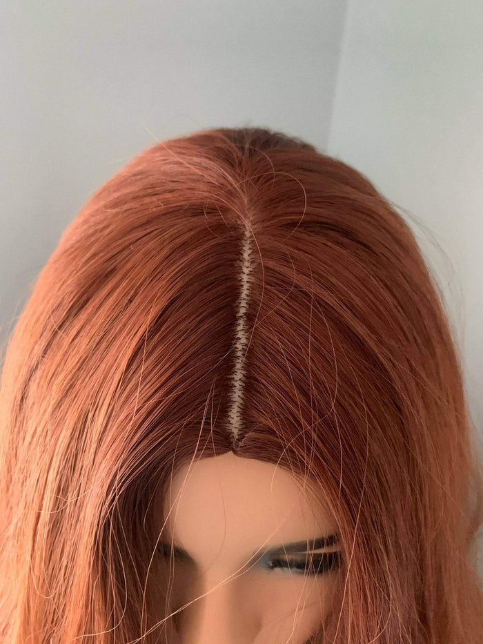 Top view of the Riri Long Red Auburn Loose Curls Wig, showcasing its rich auburn tones and natural parting.