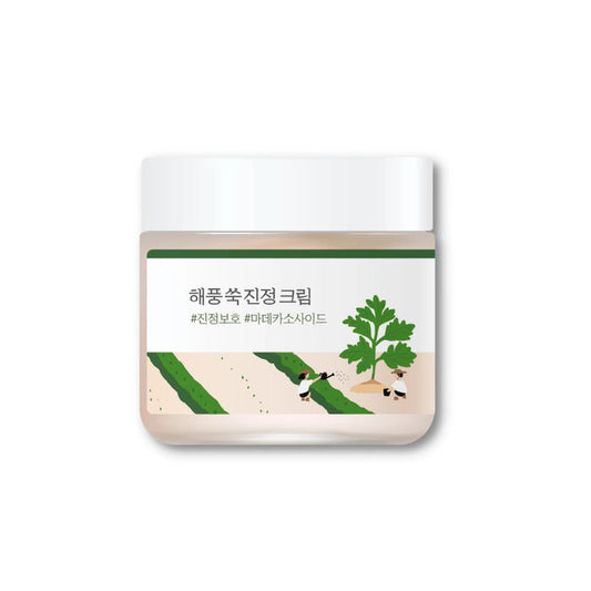 ROUND LAB Mugwort Calming Cream is a soothing and hydrating cream designed to calm sensitive and irritated skin. Formulated with Artemisia Vulgaris Extract (Mugwort) and Centella Asiatica Leaf Extract, this cream helps to reduce redness and inflammation while providing deep hydration. It also contains Madecassoside and Asiaticoside to further soothe and repair the skin barrier. Enriched with Panthenol and Allantoin, it offers additional calming benefits, leaving the skin soft, balanced, and comf