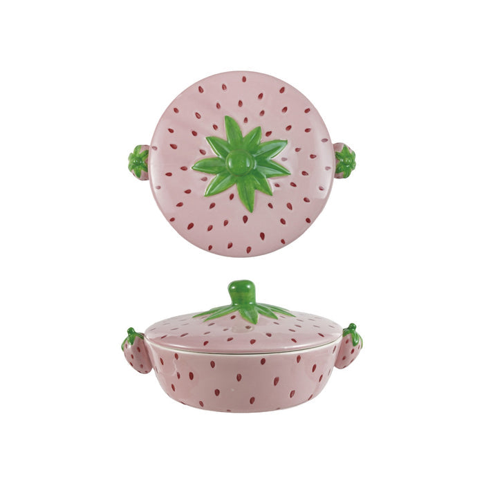 The CREATIVE COOP STONEWARE STRAWBERRY SHAPED BAKER WITH HANDLES brings playful charm to rustic kitchen decor, especially when displayed with coordinating fruit-shaped ceramics on a light textured surface.