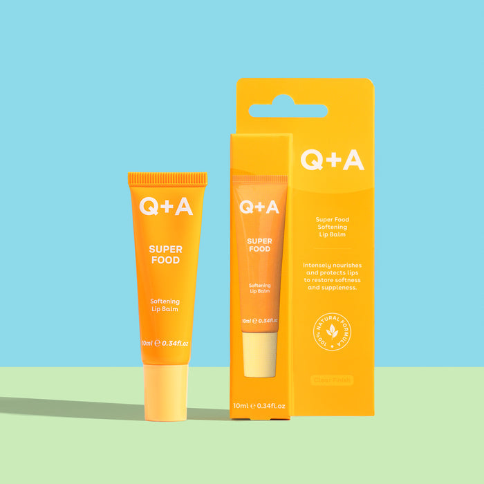 Q+A Super Food lip balm tube and packaging on a blue and green gradient background