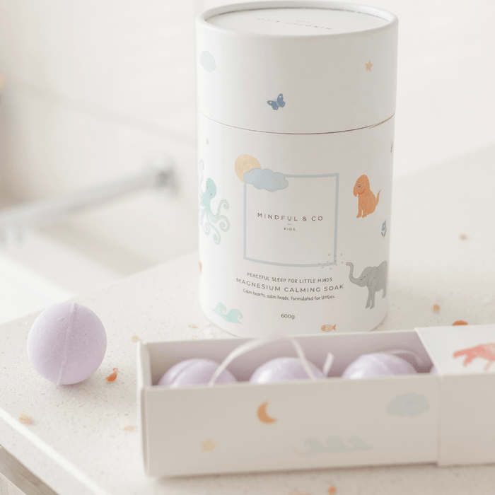 Mindful & Co magnesium calming stars in a decorative box with a branded container.
