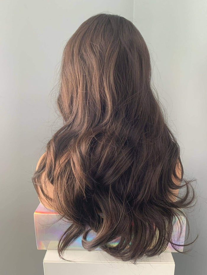 Back view of Tasha Long Dark Chocolate Brown Wig with Bangs showcasing soft waves and fullness.