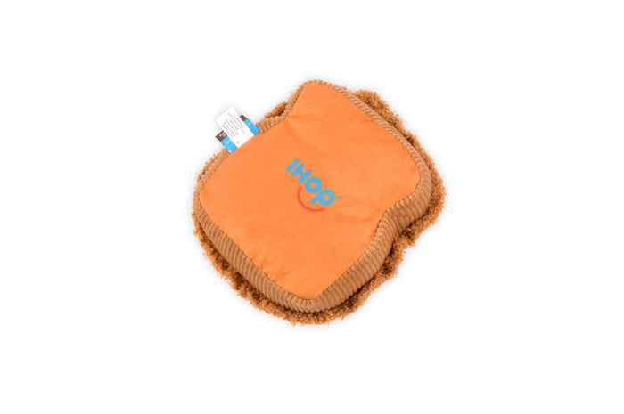 The THICK ‘N FLUFFY FRENCH TOAST DOG TOY by PLAY PET LIFESTYLES/BRANDS is a plush, squeaky dog toy designed to look like a delicious stack of French toast, topped with fabric strawberries, bananas, and syrup. Its soft texture and detailed brown edges resemble a real breakfast treat—perfect for pets who love an eco-friendly toy that looks good enough to eat.