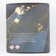 This Works Sandalwood & Orange Scented Candle packaging details on a premium glass jar.