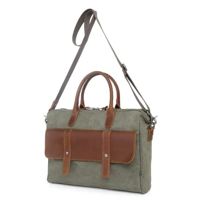 Top view of an open TSD BRAND - VALLEY HILL BRIEFCASE tote with brown leather handles, spacious interior, zip pocket, divider, and pink lining—a chic, sustainable TSD BRAND work bag for daily use.