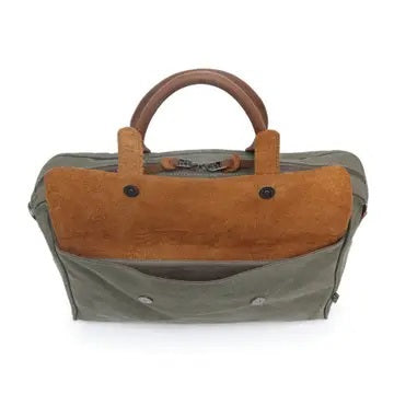 Top view of an open TSD BRAND - VALLEY HILL BRIEFCASE tote with brown leather handles, spacious interior, zip pocket, divider, and pink lining—a chic, sustainable TSD BRAND work bag for daily use.